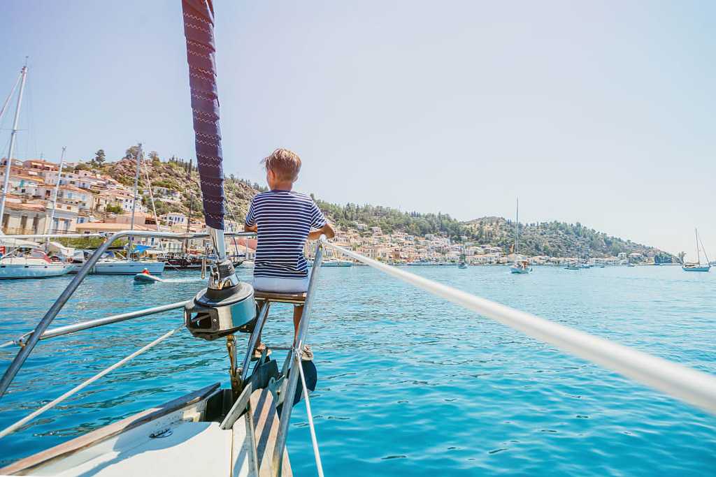 Family sailing in Greece