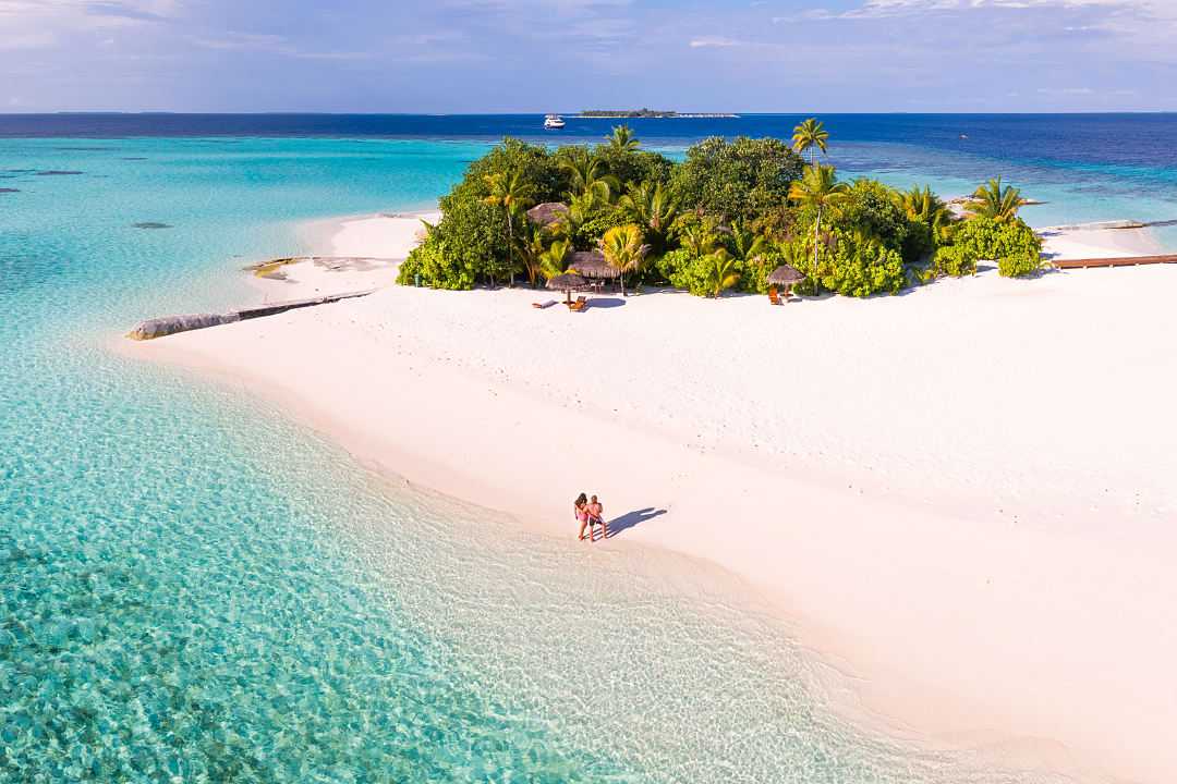 Couple on the beach in the Maldives