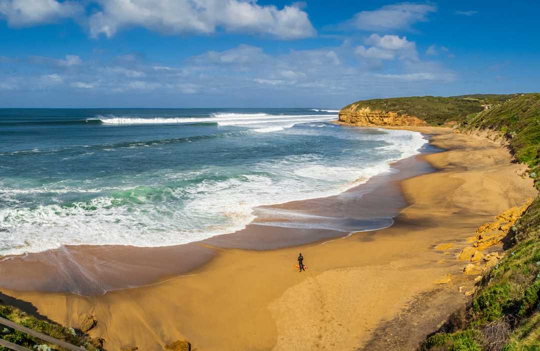 Surfer at Bells Beach in Victoria, Australia