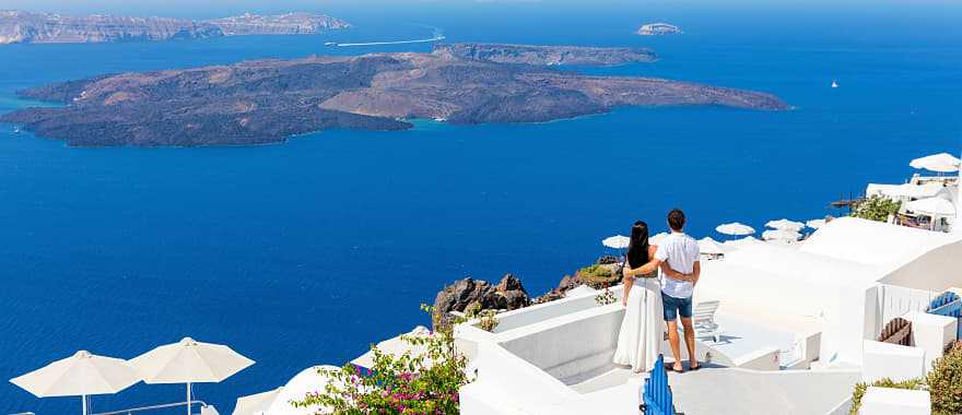 Couple enjoying the view in Santorini, Greece