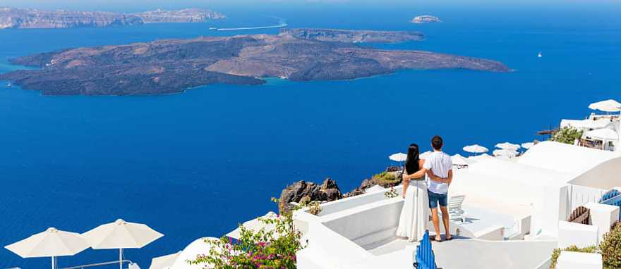 Couple enjoying the view in Santorini, Greece
