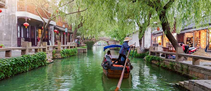Gondola runs on the canals near Shanghai in China.
