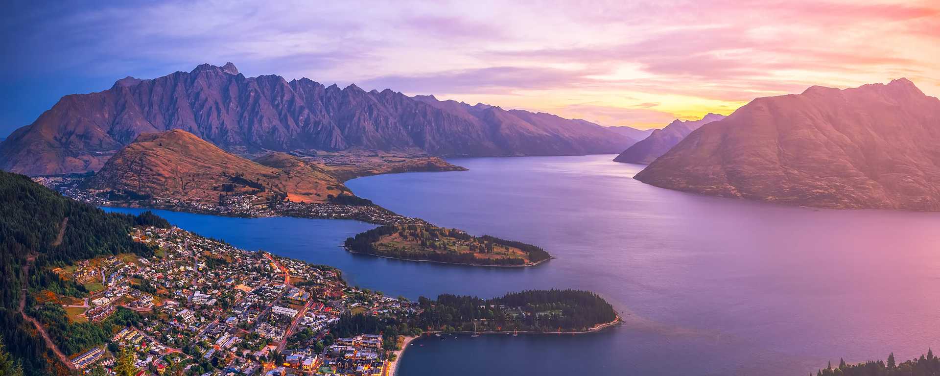 Sunset over Queenstown, Lake Wakatipu, and the majestic Remarkables mountains in New Zeland