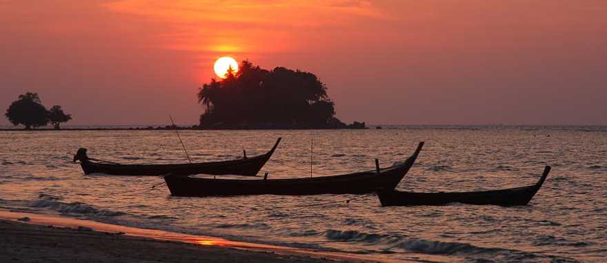 Sunset at Nai Yang beach in Phuket, Thailand. Sunset at Nai Yang beach in Phuket, Thailand.