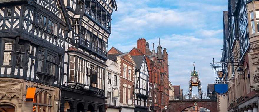 Half-timbered buildings with the Eastgate and Eastgate Clock in the old city of Chester, England Half-timbered buildings with the Eastgate and Eastgate Clock in the old city of Chester, England