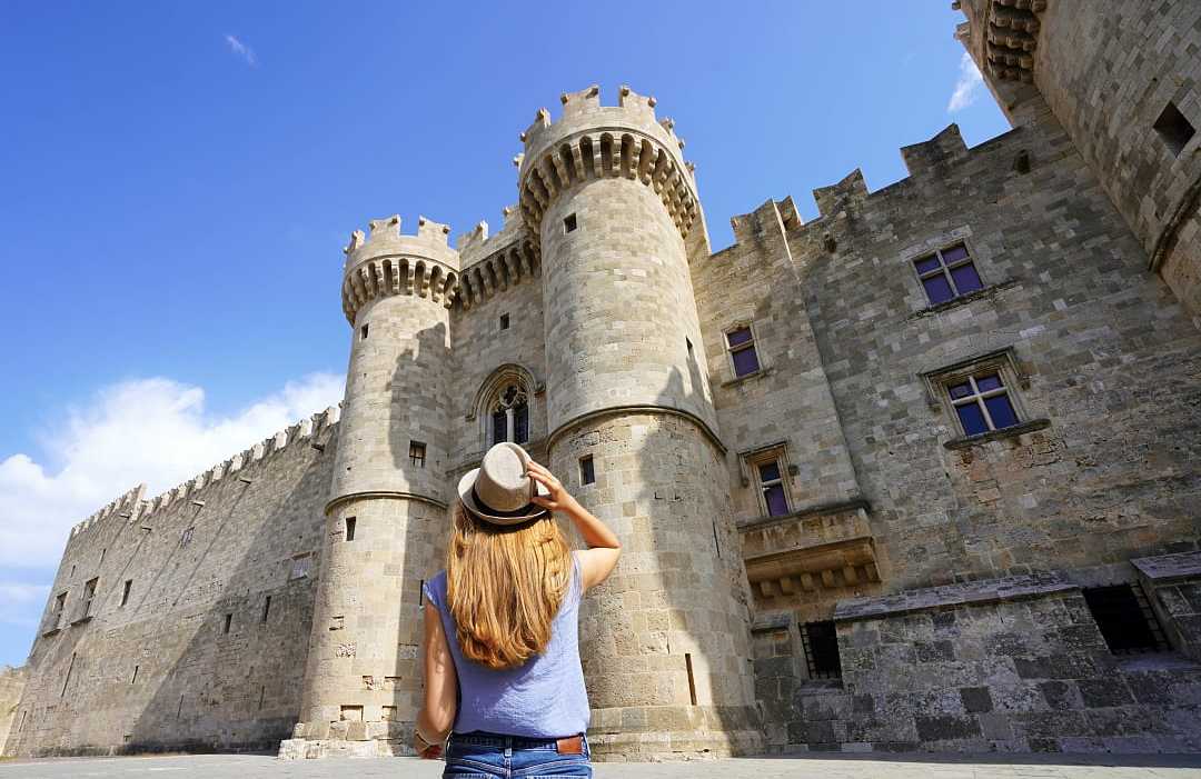 Woman visiting the Palace of the Grand Master of the Knights in Rhodes, Greece