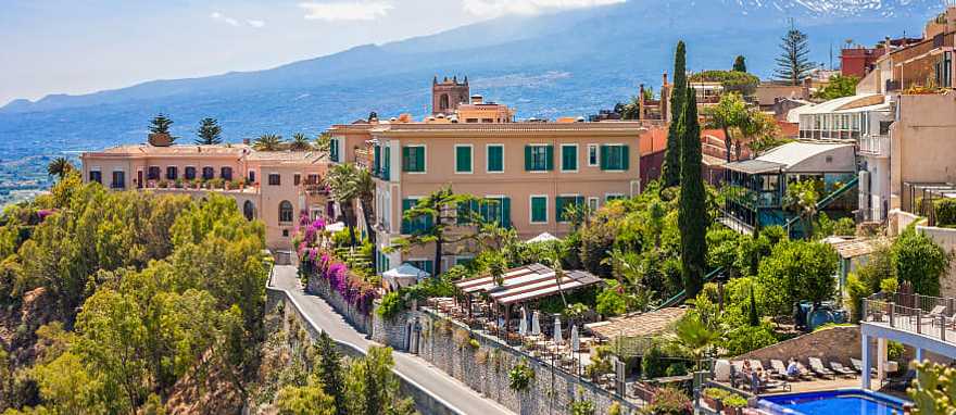 View of Taormina with Etna volcano in Sicily, ital View of Taormina with Etna volcano in Sicily, ital