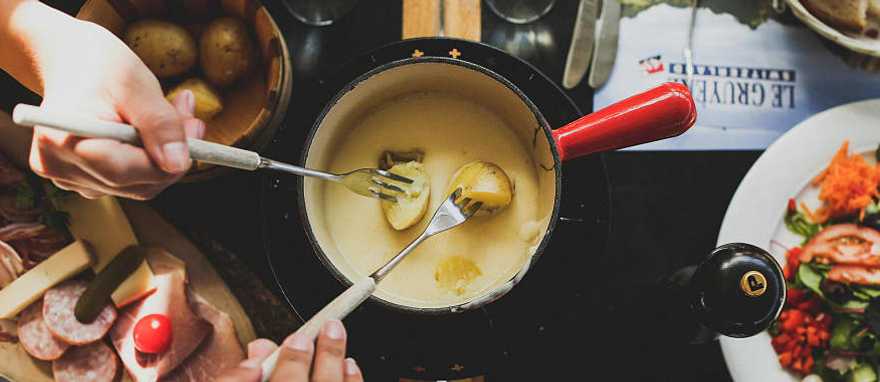 Swiss cheese fondue in Gruyères, Switzerland.