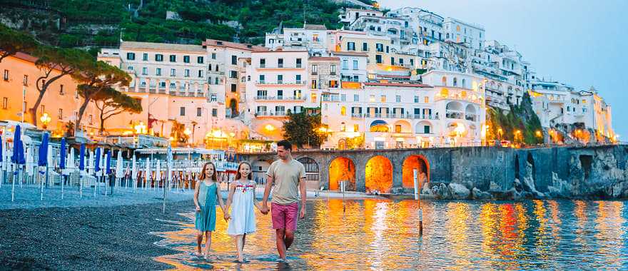 Father with his daughters on the Amalfi Coast in Italy