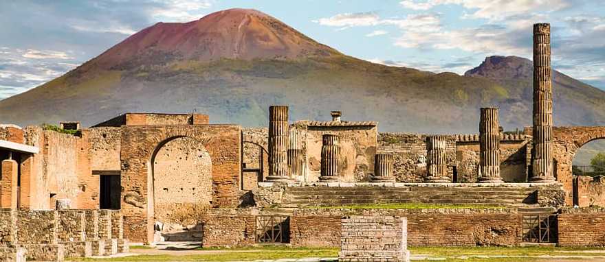 Ancient Roman city of Pompeii and Vesuvius in the background Ancient Roman city of Pompeii and Vesuvius in the background