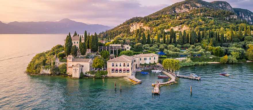 Enjoy breathtaking panoramic views of Lake Garda and the distant mountains. Enjoy breathtaking panoramic views of Lake Garda and the distant mountains.