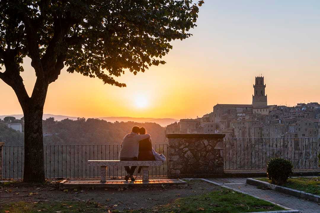 Couple in Pitigliano at sunset Tuscany, Italy 