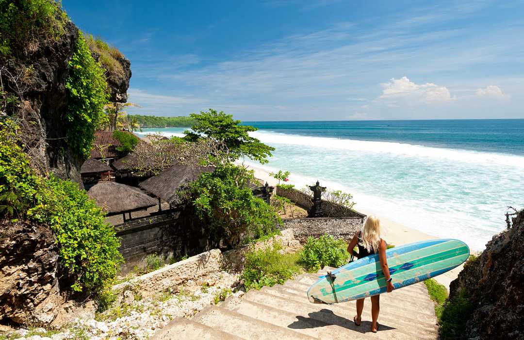 Surfer at a beach in Bali