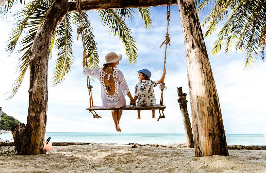 Mother and son on the beach