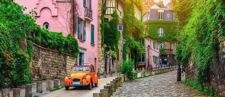 View of an old street in the Montmartre quarter in Paris View of an old street in the Montmartre quarter in Paris
