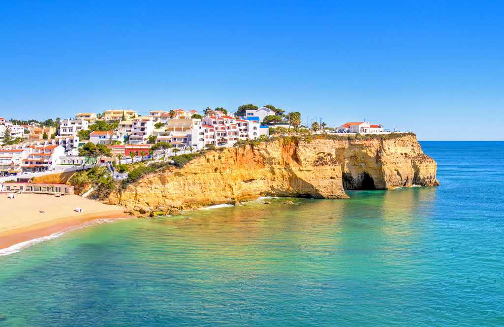 Beach and cliffside town of Carvoeiro, Portugal