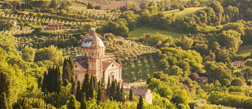 Church of San Biagio in Montepulciano surrounded by Tuscan countryside