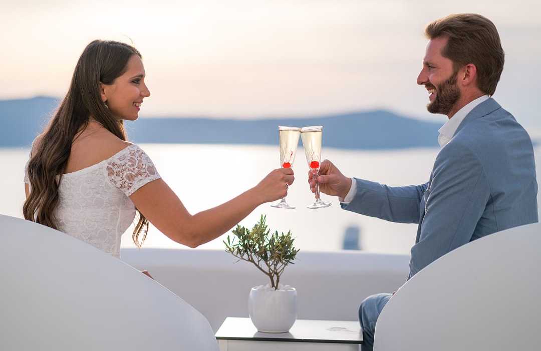 Couple in Greece at sunset.