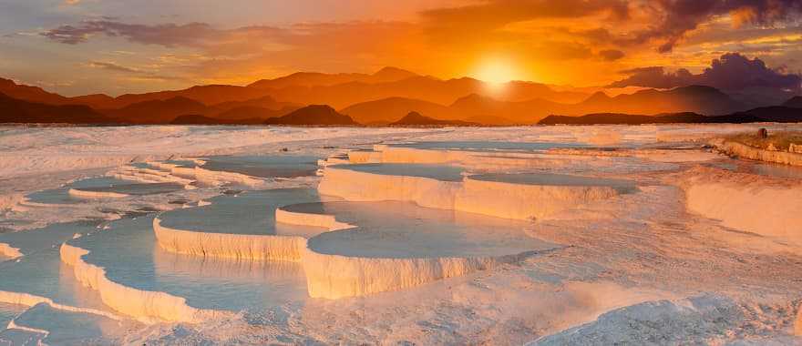 Beautiful sunrise at the Travertine pools and terraces in Turkey