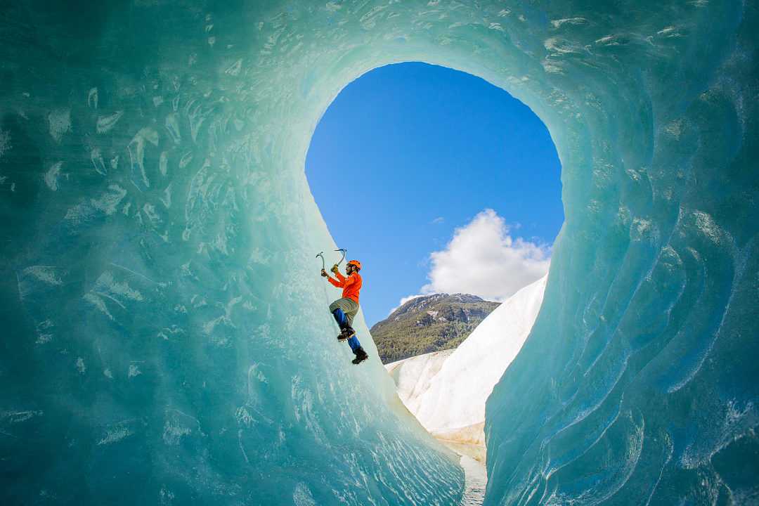 Ice climber inside glacier in Patagonia, Chile.