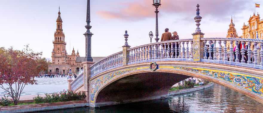 Couple at Plaza de Espana in Seville, Spain