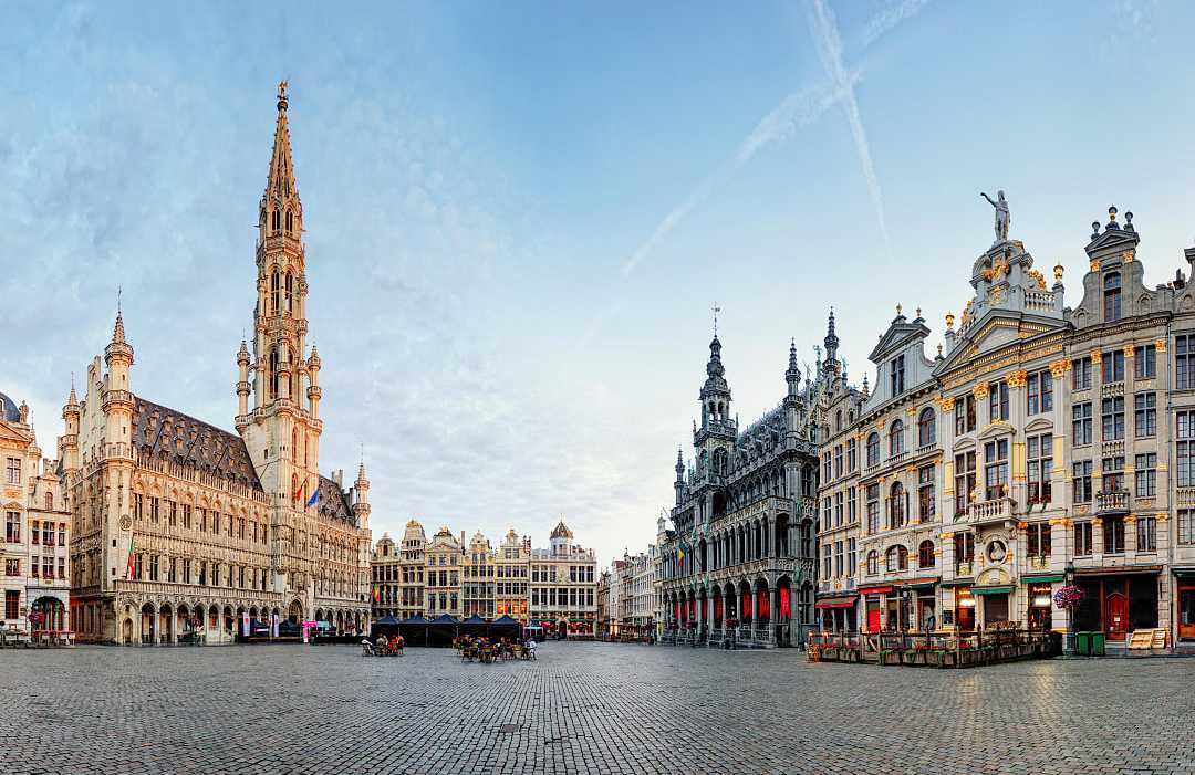 Historic guildhalls and Town Hall surrounding Grand Place square in Brussels, Belgium