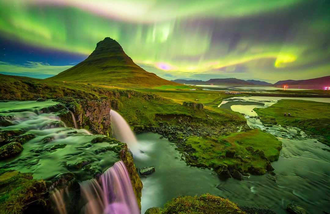 Northern lights over Mount Kirkjufell in Iceland