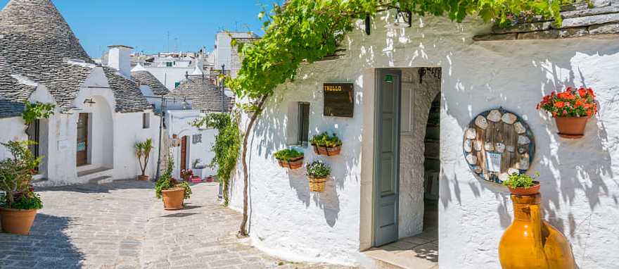 White circular Trulli houses of Alberobello in the Puglia region of Italy White circular Trulli houses of Alberobello in the Puglia region of Italy
