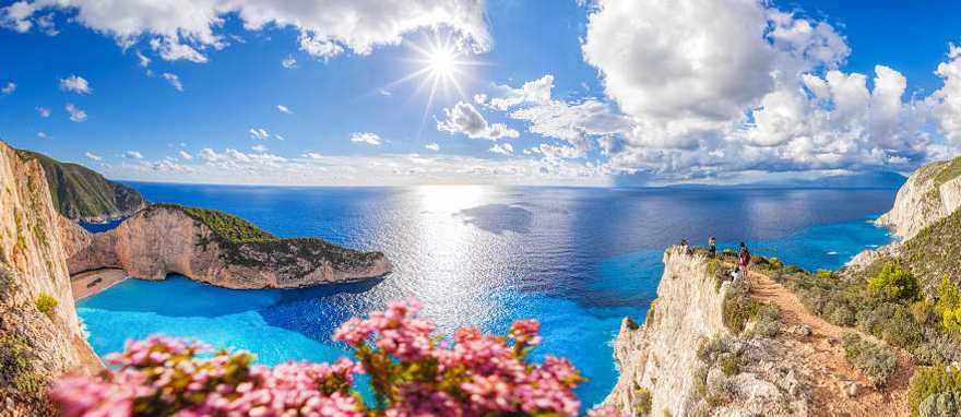 Navagio beach with shipwreck and flowers on Zakynthos island in Greece.